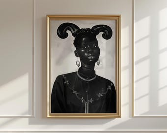 May include: A black and white portrait of a person with horns and earrings. The person is wearing a black shirt with a floral design.