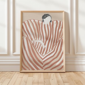 May include: A framed illustration of a person in a striped, pink and white, long-sleeved garment. The person is sitting with their arms crossed.