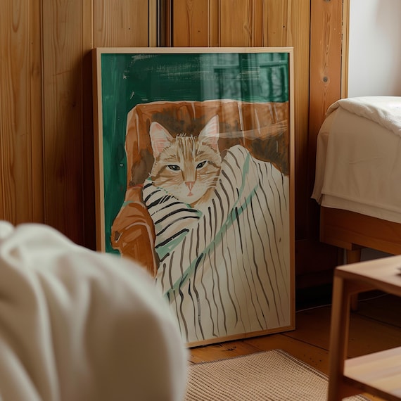 居心地の良いトラ猫のアートプリント：ストライプ柄の毛布のイラスト