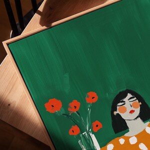 Woman in orange polka dot dress, holding wine glass, modern feminine print, bold green background, floral wall art, digital download, poster