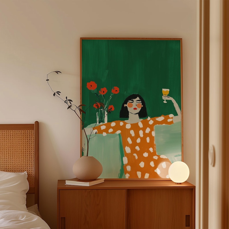 Woman in orange polka dot dress, holding wine glass, modern feminine print, bold green background, floral wall art, digital download, poster