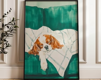 Può includere: Un dipinto ad acquerello di un Cavalier King Charles Spaniel che dorme su un divano verde con una coperta bianca. Il cane è marrone e bianco con gli occhi chiusi.