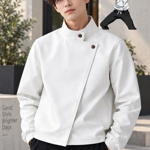 May include: A white jacket with a high collar, an asymmetrical front closure, and two brown buttons. The jacket features long sleeves with elastic cuffs and is paired with black trousers. An anime character illustration is visible in the top right corner.