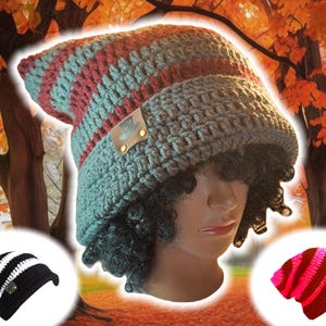 May include: A crocheted beanie hat with a red and teal striped pattern. The hat has a small brown leather patch with the word "Just" on it. The hat is being modeled on a mannequin with curly hair.