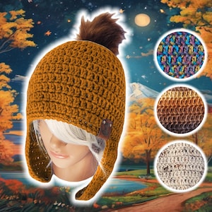 May include: Mustard yellow crochet hat with ear flaps and a brown pom-pom. The hat has a small brown leather accent on the side. Three circular close-ups show the crochet texture in various colors. The background features an autumn landscape with trees and a lake.