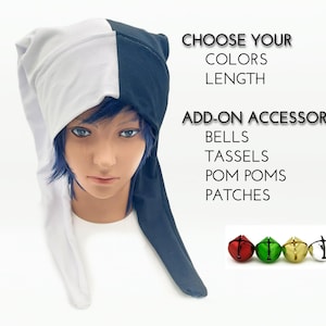 May include: A long, two-toned hat split vertically into white and black sections. Text reads: CHOOSE YOUR COLORS LENGTH, ADD-ON ACCESSORIES, BELLS, TASSELS, POM POMS, PATCHES. Four small metallic bells in red, green, gold, and silver are shown below.