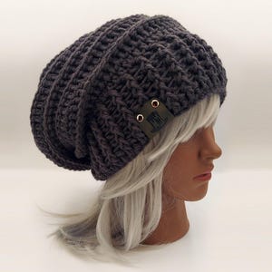textured layers and large ribbed stretchy brim in this super slouchy hand crocheted beanie. ribbed toque - charcoal gray. These extra slouchy beanies have a baggy back but the stretchy ribbed brim stays securely on the head making it extremely comfortable and stylish.  This oversized beanie goes with many outfits and will draw eyes!  #modern beret beanie #baggy rastacap #oversized beanies #handmade crochet hat #baggy tams #big toques #customizable toboggans #textured chunky beanies
