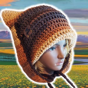 May include: A handmade crochet hat in shades of brown and tan, featuring ear flaps and a leather tag. The hat is designed to fit snugly and has a drawstring for adjustment. This cozy hat is perfect for cold weather.
