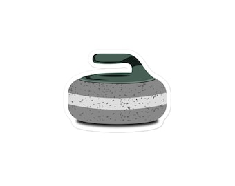 May include: A gray curling stone with a green handle. The stone has a white stripe around the middle.