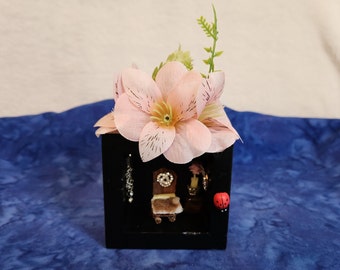 Fairy Bedroom Indoor Black with Pink Flowers Wooden Bed with Faux Fur Bedspread a Tigers Eye Night Stand and Diamond Ornaments on the Walls