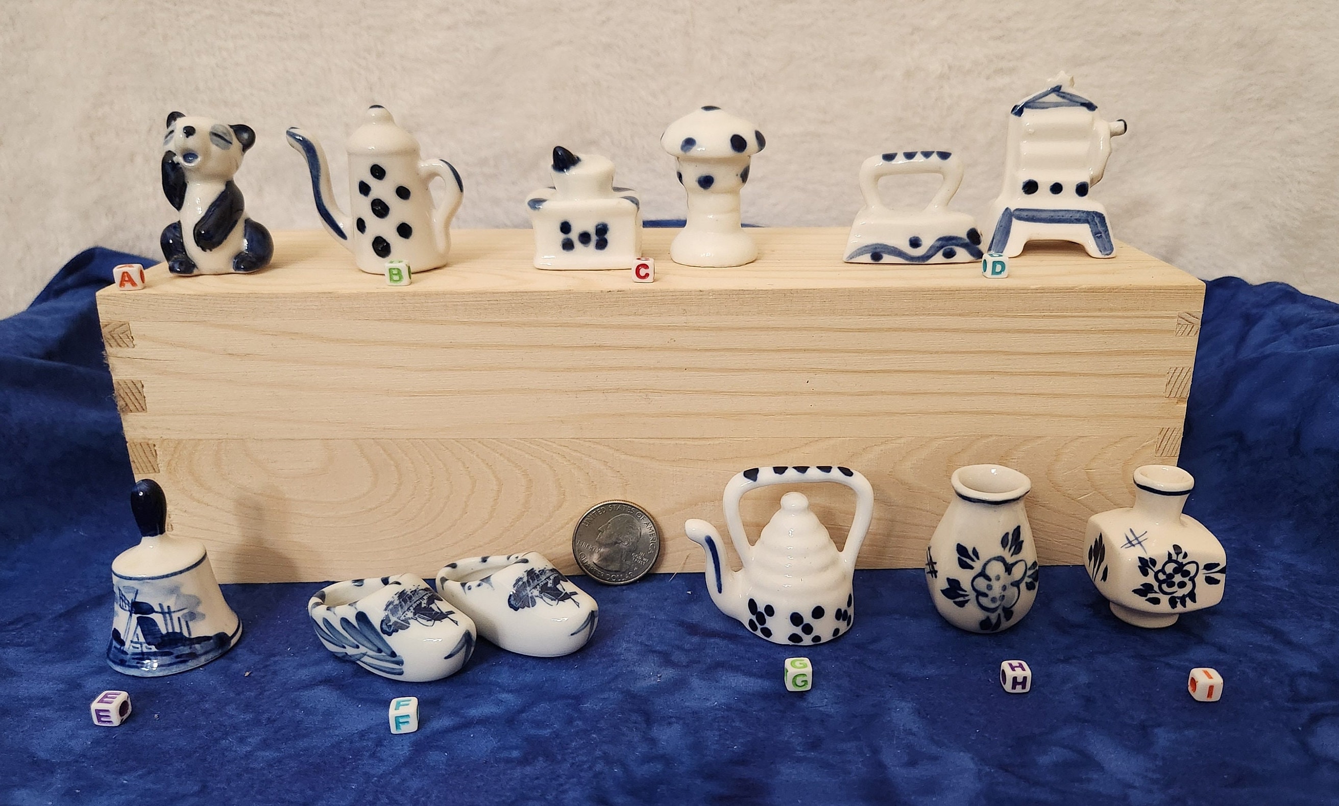 Miniature Delfts Blue and White Figurines including Panda Vases Dutch Shoes Bell  Iron Wash Board and Other Items