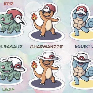 May include: Three cartoon stickers featuring the original Pokemon starter characters: Bulbasaur, Charmander, and Squirtle. Each sticker features the Pokemon in a different pose, wearing a hat, and with their name written below.