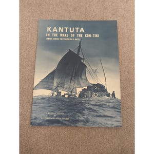 May include: A souvenir program titled "KANTUTA IN THE WAKE OF THE KON-TIKI (TWICE ACROSS THE PACIFIC ON A RAFT)". The cover features a black and white image of a sailboat on the ocean. The program is by Eduard and Nina Ingris.