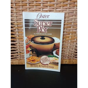 May include: An Oster Super Pot all-purpose electric cooker recipe and instruction booklet. The cover features a brown and black pot with a black lid, surrounded by images of cooked food. The booklet includes the text "Kitchen Tested Recipes".