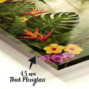 May include: A rectangular plexiglass wall art piece featuring a vibrant tropical scene with green monstera leaves, ferns, yellow hibiscus flowers, red bird of paradise flowers, and purple orchids. The text 4.5 MM Thick Plexiglass is visible.