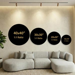May include: Four black circular wall art displays arranged horizontally, labelled with sizes 40x40", 30x30", 20x20", and 10x10" in gold text, each indicating a 1:1 ratio. These circular panels are positioned above a light grey sectional sofa.