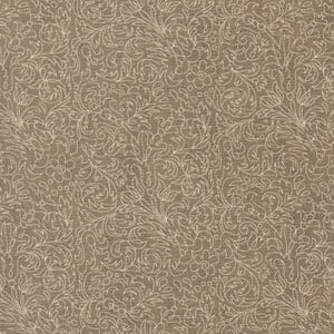 May include: A close-up of a fabric with a repeating pattern of white floral and leaf designs on a brown background. The pattern is detailed and intricate, with swirling lines and delicate shapes. The fabric has a slightly textured appearance.