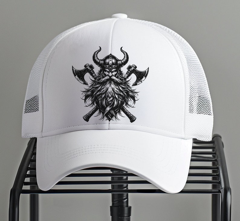 May include: White trucker hat with a black and white illustration of a Viking with a beard and axes.