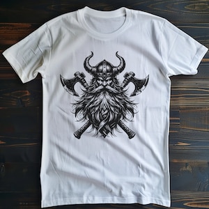 May include: White t-shirt with a black and white graphic of a Viking warrior with a horned helmet and crossed axes.