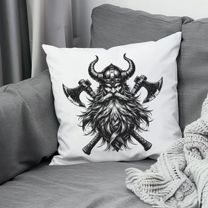 May include: White throw pillow with a black and white illustration of a Viking warrior with crossed axes. The warrior is wearing a horned helmet and has a long beard.