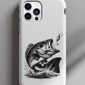 K&ouml;nnte beinhalten: Eine wei&szlig;e Handyh&uuml;lle mit einer Schwarzwei&szlig;illustration eines Barsches, der mit einem K&ouml;der im Maul aus dem Wasser springt.
