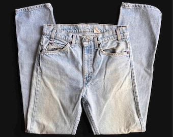 Vintage distressed 80’s Levi's 505 upside-down orange tab error made in USA 32x34