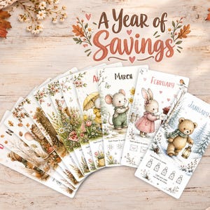 May include: A set of twelve illustrated monthly savings tracker cards titled A Year of Savings. Each card features seasonal animal characters, floral motifs, and specific savings goals with icons for January through December in a fan layout.