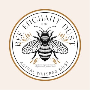 May include: A round label with a black and white bee illustration. The label reads "BEE ENCHANT DUST" and "ASTRAL WHISPER DUST" in a circular design. The label also includes the text "6 OZ" and ingredient information.