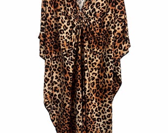Roper Romp Complete Costume. Auburncurly wig, kaftan robe, jewelry, glasses, Stanley head. Helen caftan. One size fits most.