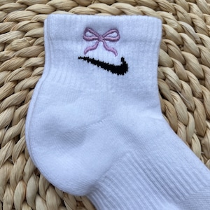 white and purple nike socks