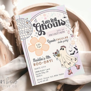 May include: A Halloween-themed invitation with the text "Lets Roll Ghouls" and "Spooktacular skate party!" features a disco ball, spiderwebs, and a ghost wearing roller skates. The invitation is on a wooden tray with a soft, neutral-colored cloth.