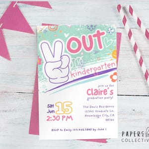 May include: A graduation party invitation with the words "OUT kindergarten" and a peace sign. The invitation is light blue, pink, and white, with the details of the party. Pink and white striped straws and a pink banner are also in the image.