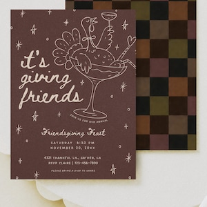 Printable Friendsgiving invitation styled on softly draped ivory fabric with warm natural shadows and a coordinating scalloped cream paper detail. The dark brown card features delicate blush pink line art of a festive cocktail glass with bows, scattered stars, and hand-lettered “it's giving friends” text. This whimsical Thanksgiving dinner invitation combines modern retro styling with a playful fall color palette and is fully editable in Canva, including all invitation wording and colors.
