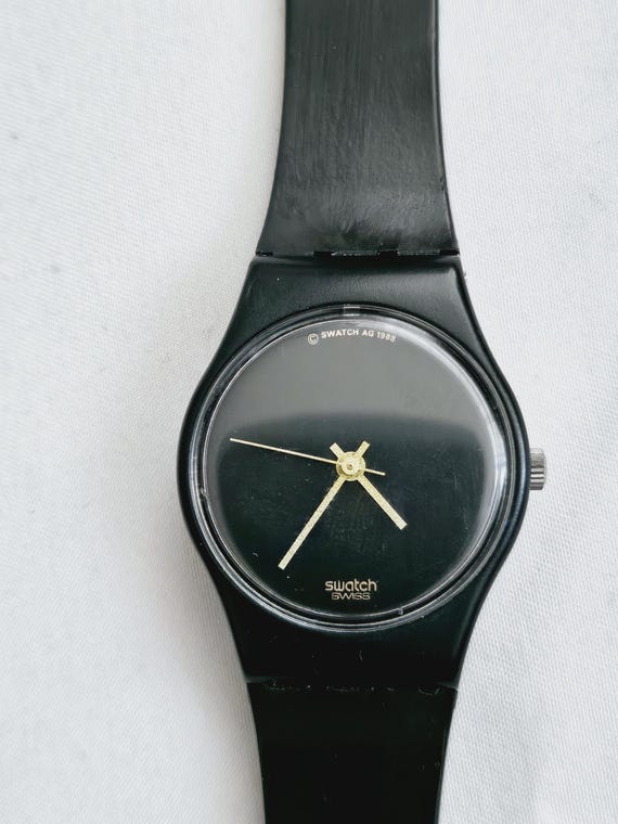 Black women's swatch watch hotsell