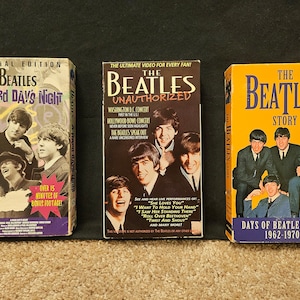 Set of 3 Beatles Pre-Owned VHS tapes in Great Condition! A Hard Days Night, The Beatles Unauthorized and The Beatles Story!