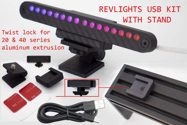 May include: A Revlights USB kit with a carbon fiber-textured light bar featuring purple and red LED lights, a black adjustable stand, a USB cable, two red 3M VHB adhesive squares, and a twist lock for 20 and 40 series aluminum extrusion profiles.