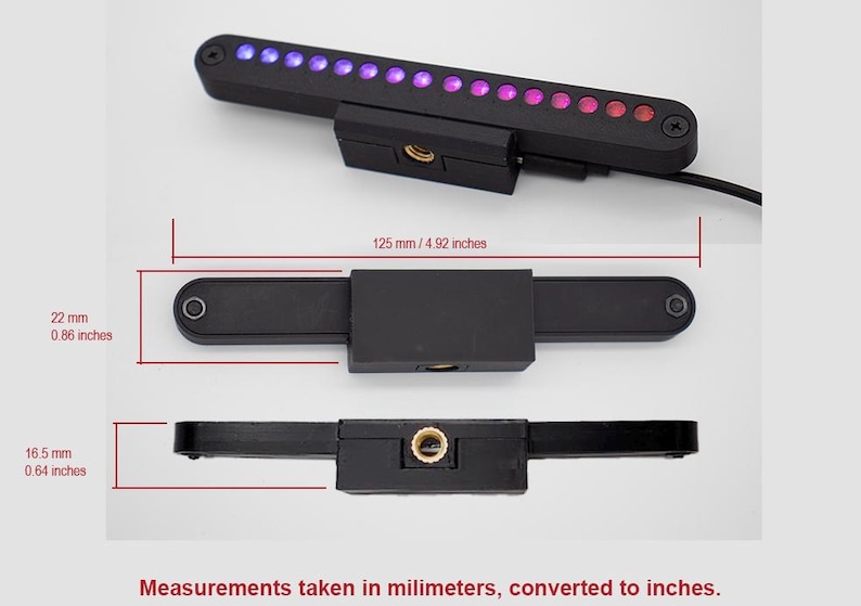 May include: A black rectangular LED light bar with a row of purple and red lights. The device features a central mounting block with a threaded hole. Dimensions are 4.92 inches long, 0.86 inches wide, and 0.64 inches deep as indicated by text.