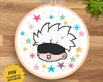 May include: Cross stitch pattern featuring a cartoon character with white hair and a black eye patch, surrounded by colorful stars. The pattern is in a round embroidery hoop.