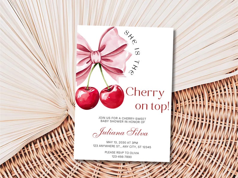 May include: A pink and white baby shower invitation with a watercolor illustration of two red cherries and a pink bow. The text reads "She is the Cherry on top!" and includes the details of the event, including the date, time, location, and RSVP information.