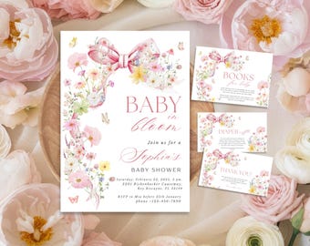 May include: A baby shower invitation suite with a floral bow design. The invitation reads "Baby in Bloom" and includes details for Sophia's baby shower. Additional cards include "Books for baby", "Diaper", and "Thank You".