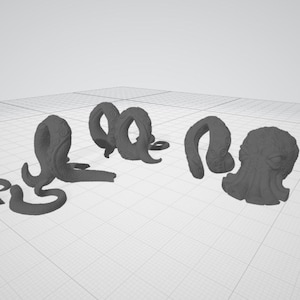 May include: Four gray 3D printed octopus figurines. The octopus figurines are in various poses, with tentacles curled and extended.