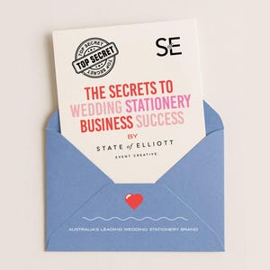 May include: A light blue envelope with a white card inside. The card reads "THE SECRETS TO WEDDING STATIONERY BUSINESS SUCCESS" with a "TOP SECRET" stamp. A red heart is on the envelope, and the text "AUSTRALIA'S LEADING WEDDING STATIONERY BRAND" is at the bottom.