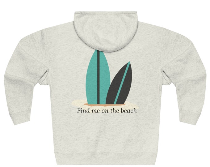 Surf inspired Unisex Zip Hoodie with a back print of a surf board and the message "Find me on the beach."