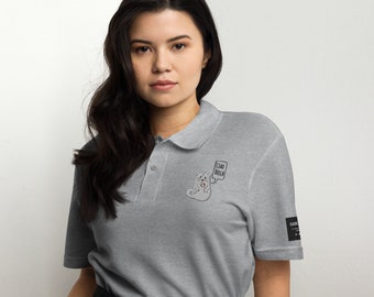 The “Ciao Bella” Feline Polo Shirt for women is an elegant and playful piece that adds a touch of feline charm to your wardrobe.