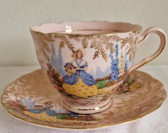 Vintage. Colclough, rare porcelaine rose, service à thé avec fleurs dorées, tasse et soucoupe, Lady in the garden, bord doré, fabriqué en Angleterre.