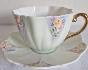 Vtg. Paragon China dipinto a mano, set da tè, tazza e piattino, forma unica, prodotto in Inghilterra, fine bone china.