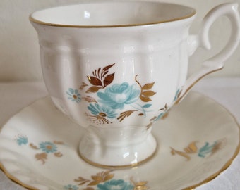 Vintage. Crown Staffordshire, porcelaine fine, service à thé, tasse à thé et soucoupe, fleurs bleu turquoise, fleurs, parfait