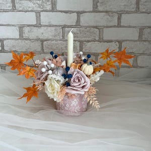 Autumn decor with candlestick - flower arrangement with autumn leaves, fall table or fireplace decor, Thanksgiving table decor