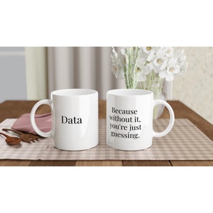 May include: Two white ceramic mugs with black text. One mug says "Data" and the other mug says "Because without it, you're just guessing."
