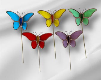 Mariposa de vidriera, estaca para planta de mariposas